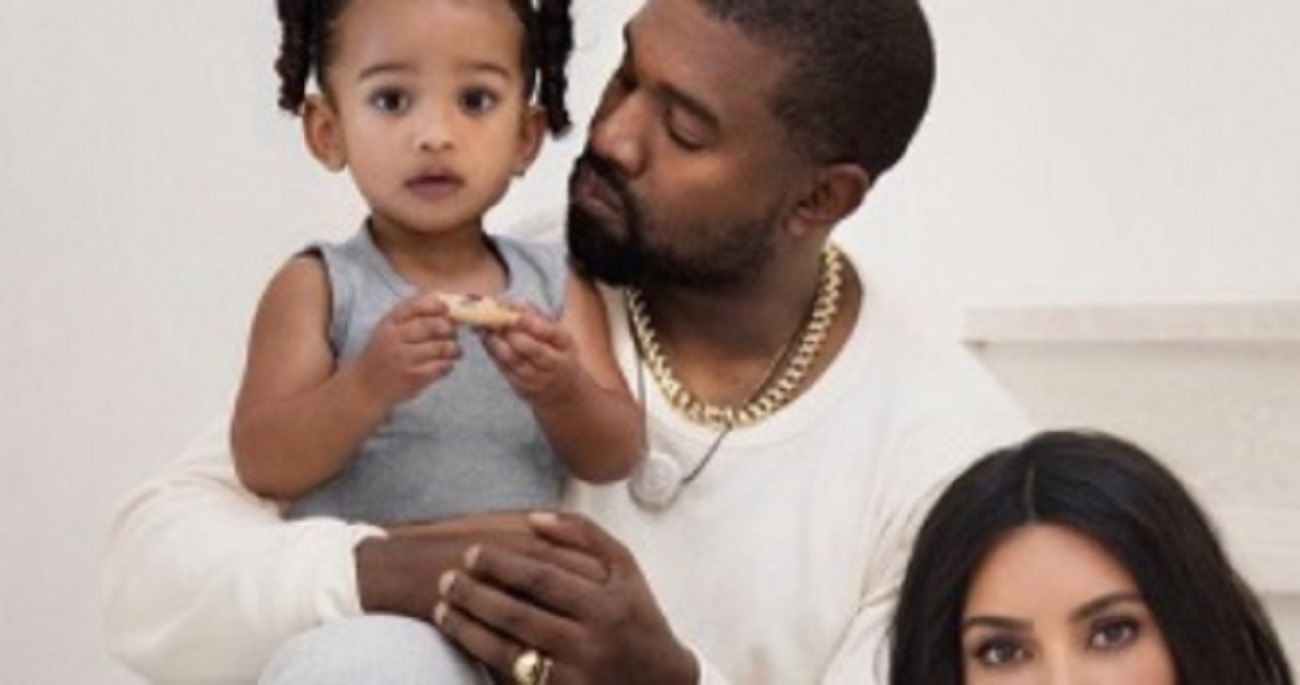 Kim Kardashian and Kanye West Wear Sweatpants on 2019 Christmas Family Card Making Fashion History