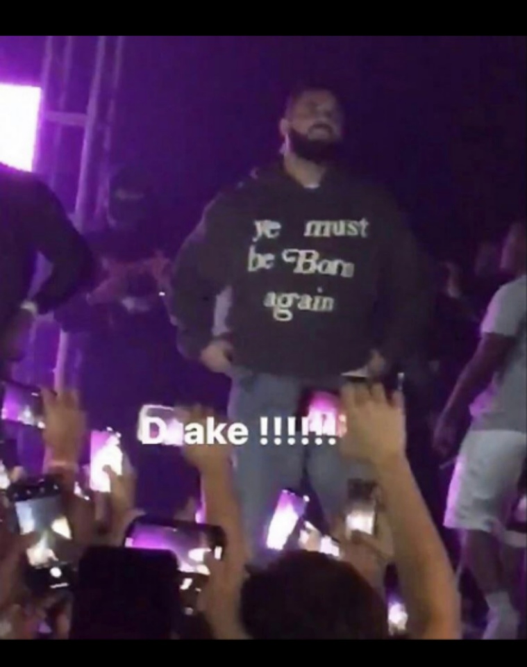 Drake disses takes shots Kanye West wearing shirt hoodie saying 'Ye Must be Born Again" at concert