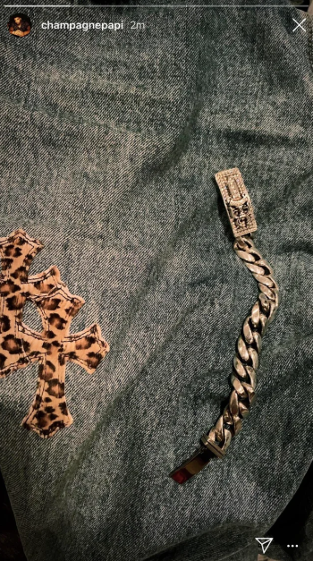 Drake Sends NEW Cryptic Message to his Dad of a Chain, Nails, and Leopard Print Cross after Diss ????