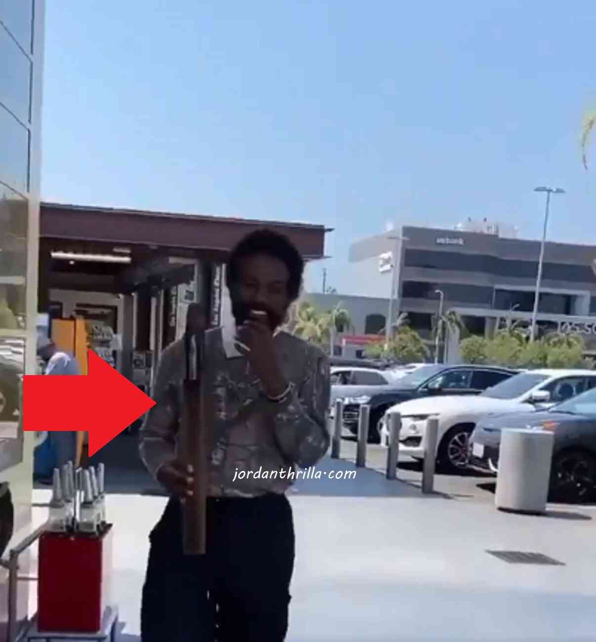 Andre 3000 Spotted Playing Flute Outside Gas Station in Hunting Gear