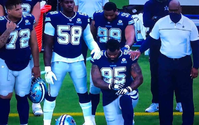 re34t345q5y53y dontari poe kneeling during national anthem