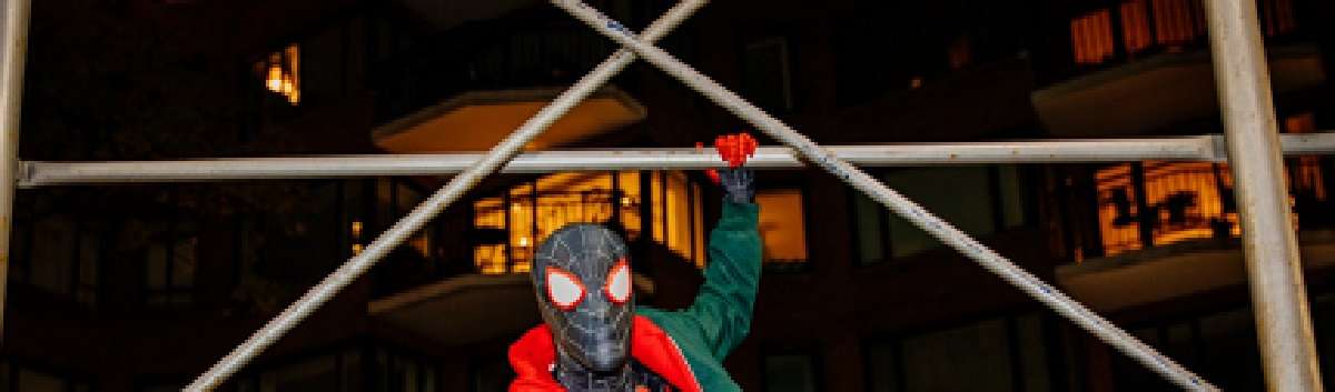 Big Sean Dresses Up in Spider-man Costume for Halloween and literally Climbs and Swings around City
