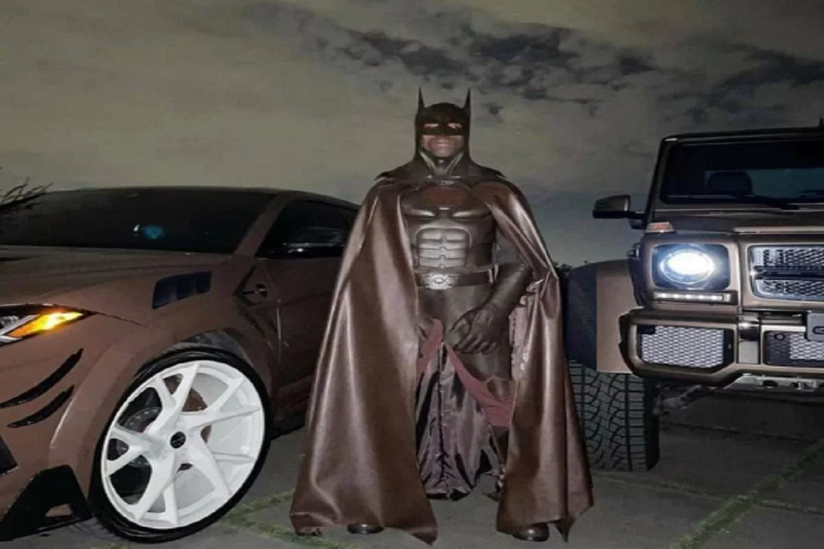 Travis Scott Deactivates Instagram After People Clown Travis Scott Batman Costume with Racist Jokes