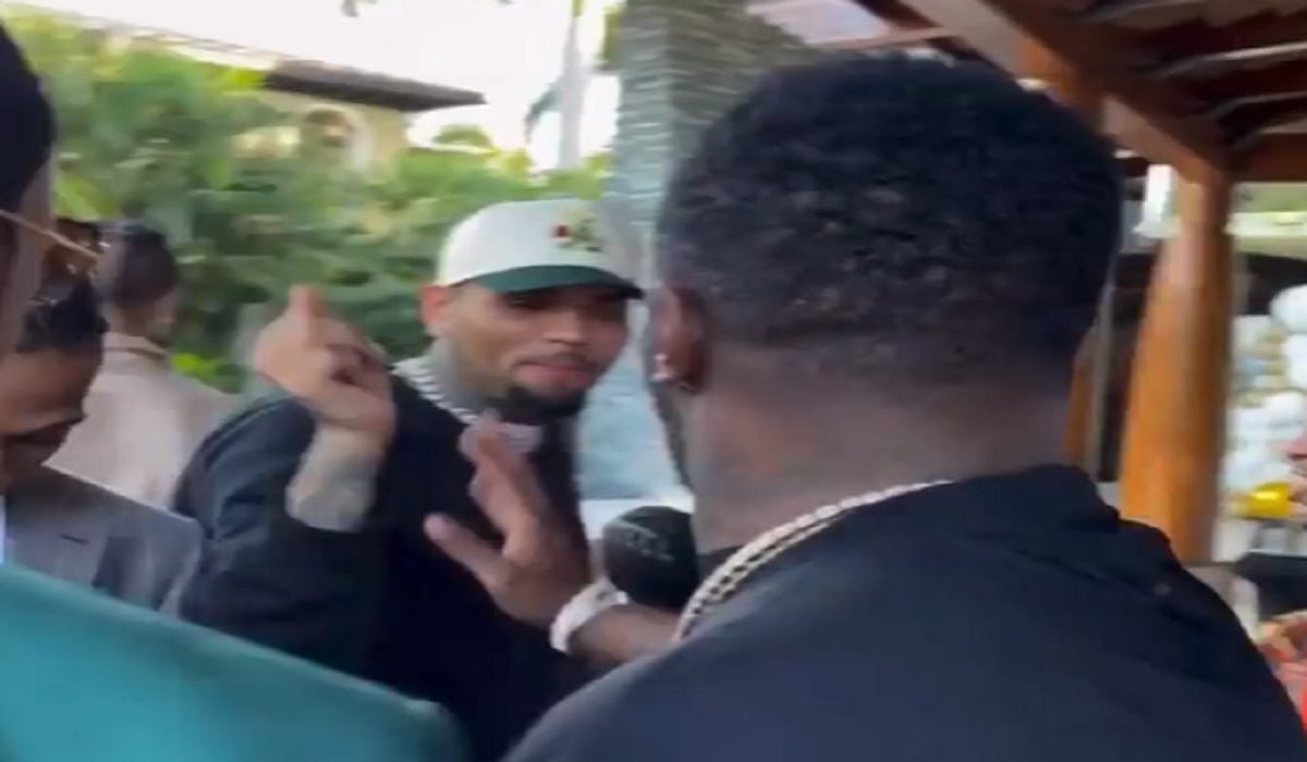 Why Did Chris Brown Throw Up his Blood Gang Set with P Diddy at New Years Party?