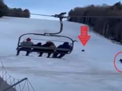 Black Bear Chasing Skier Down Snowy Mountain As Frightened Onlookers Watch His F...