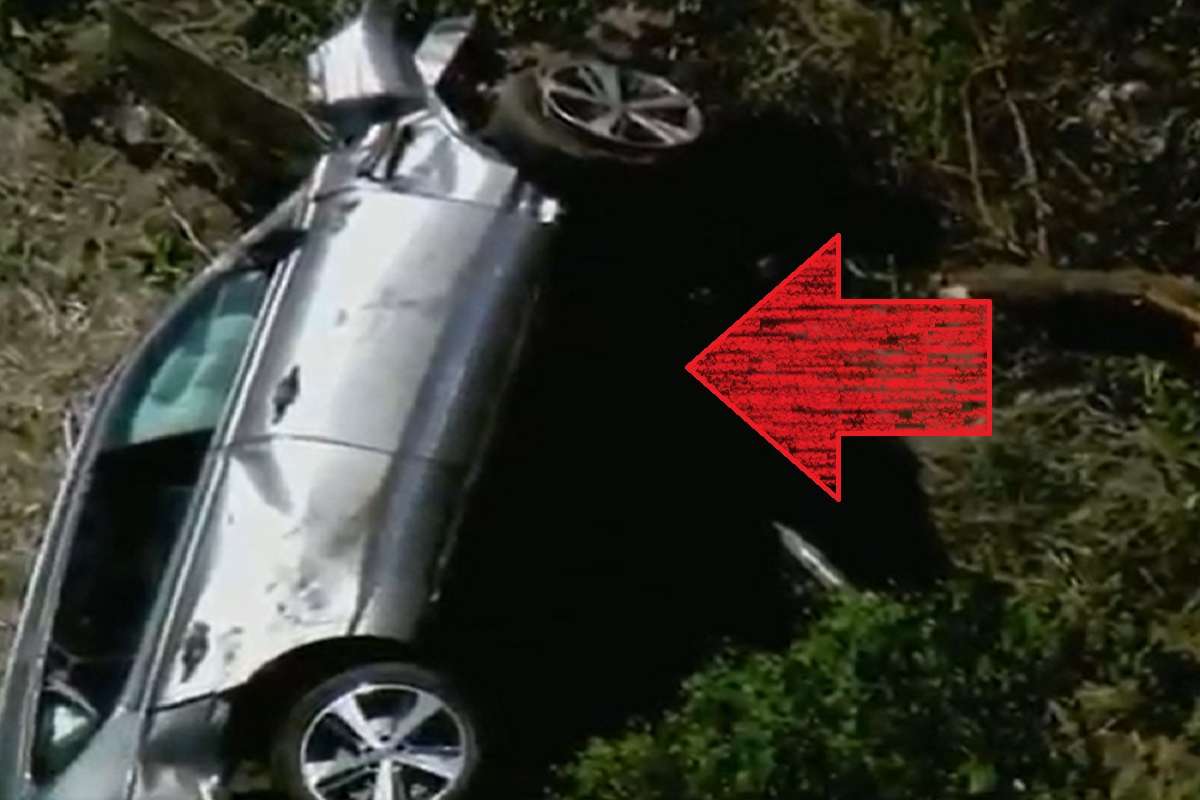 Tiger Woods Car Accident aftermath where Tiger Woods breaks both legs and is saved by "Jaws of Life".
