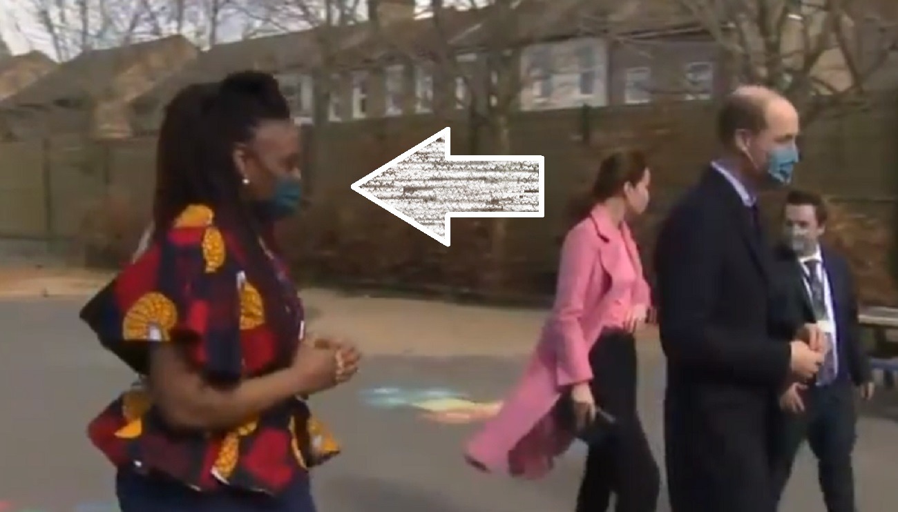 Black Woman walking with Prince Williams and Royal Family