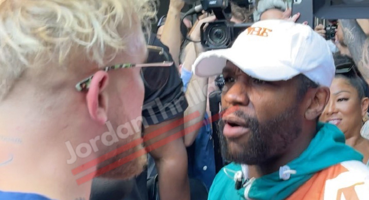 Jake Paul Fights Floyd Mayweather at Press Conference: Jake Paul Steals Floyd Mayweather Hat Starting Massive Brawl