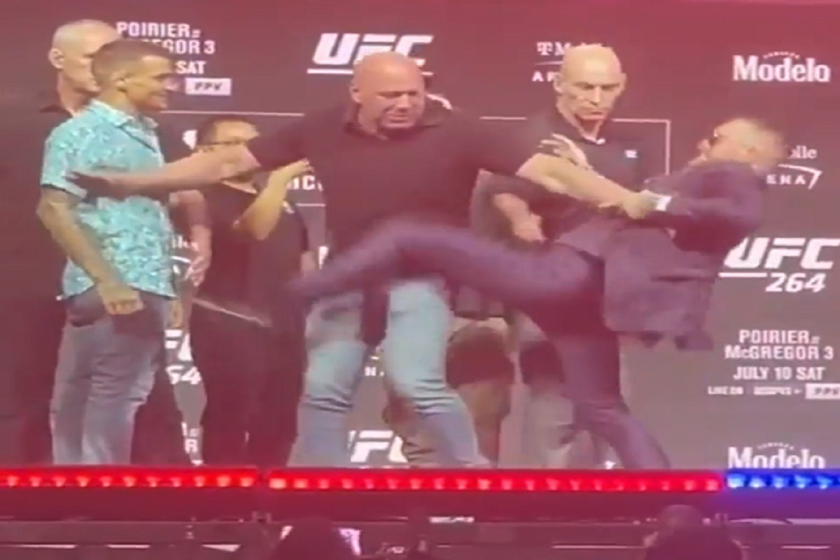Conor McGregor Kicks Dustin Poirier During Face Off Almost Injuring Him Before Their Match