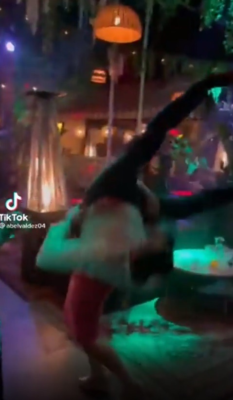 Woman Power Slams Man Who Started Twerk Dancing On Her at Party and Becomes an Internet Legend. Woman slams man flirting with her during a party.