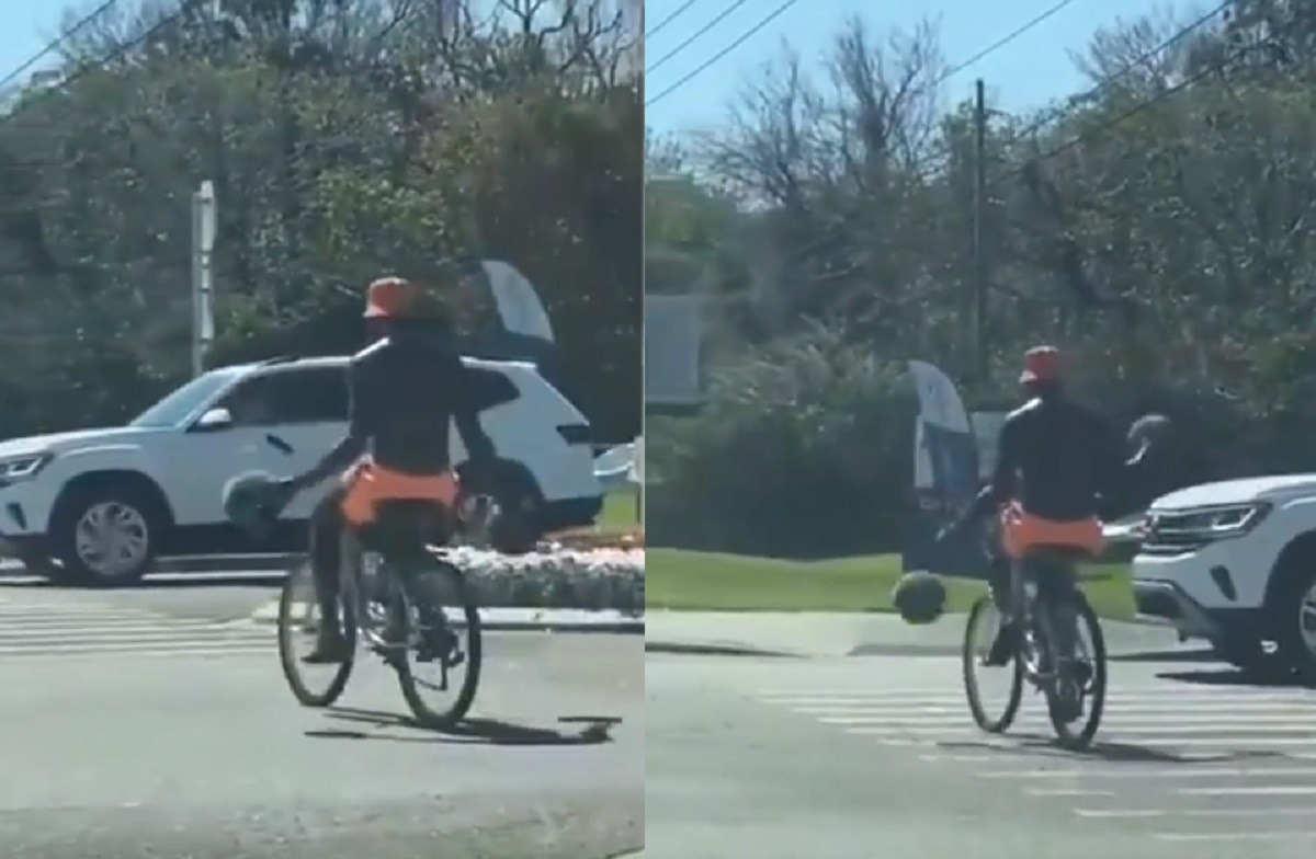 Who Is the Man Dribbling Two Basketballs While Riding a Bike In Orlando Florida?