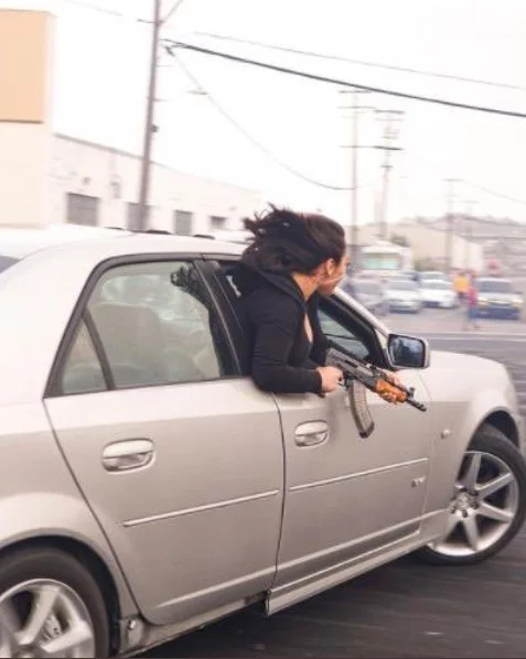 Woman Hanging Out Car Window With AK-47 Rifle in San Francisco Goes Viral