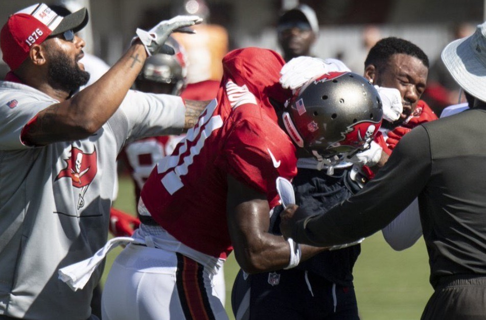 AB Antonio Brown Almost Knocks Out Chris Jackson During Fight at Bucs vs Titans Joint Practice. Antonio Brown fighting Chris Jackson. Antonio Brown punches Chris Jackson in face.