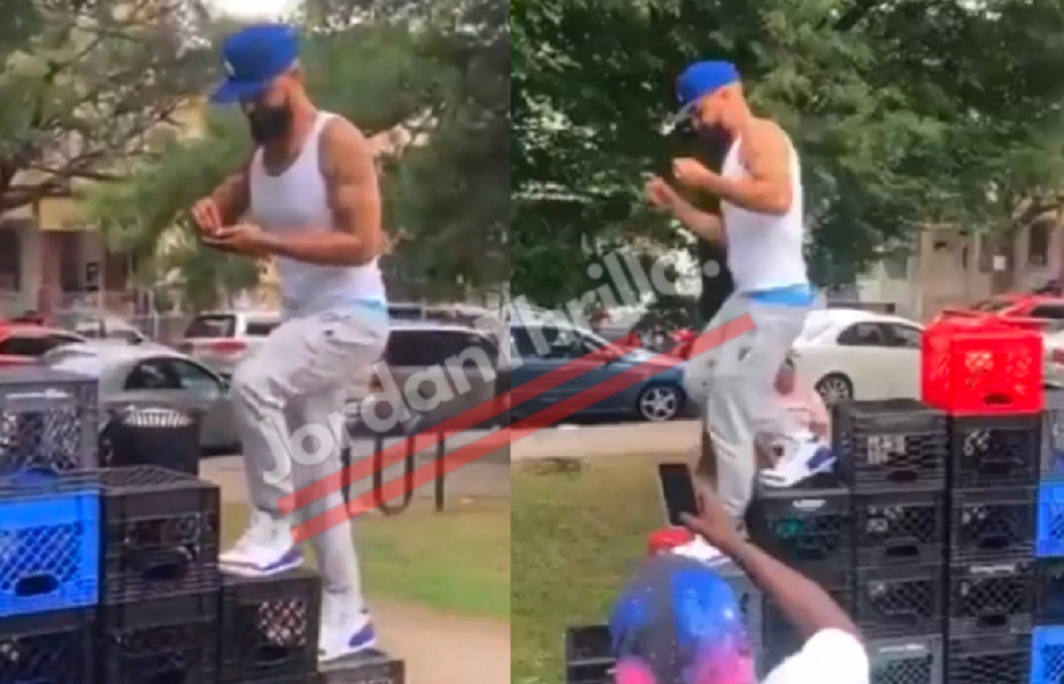 Viral Video Shows Man Named 'White Mike' Completes Crate Challenge While Rolling a Blunt of Marijuana. White Mike rolling a blunt while doing the crate challenge in Jordans