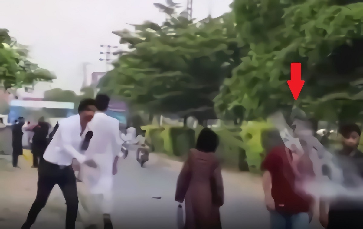 Viral Prank Video Shows Indian News Reporter Throwing Water Balloons at Man Walking By Then Pretending He Didn't Do It. Indian reporter hits man with water balloons. Indian news reporter water balloon video.