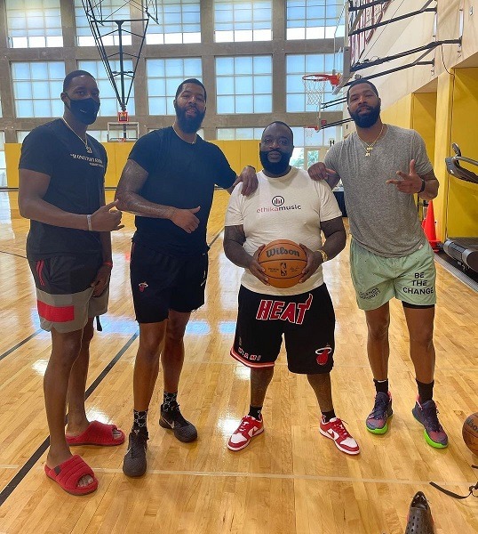 Bam Adebayo and Morris Twins Towering Over Rick Ross Sparks Geoffrey Butler Comparisons. Rick Ross Geoffrey Butler comparison picture. Rick Ross standing next to Marcus and Markieff Morris height difference.