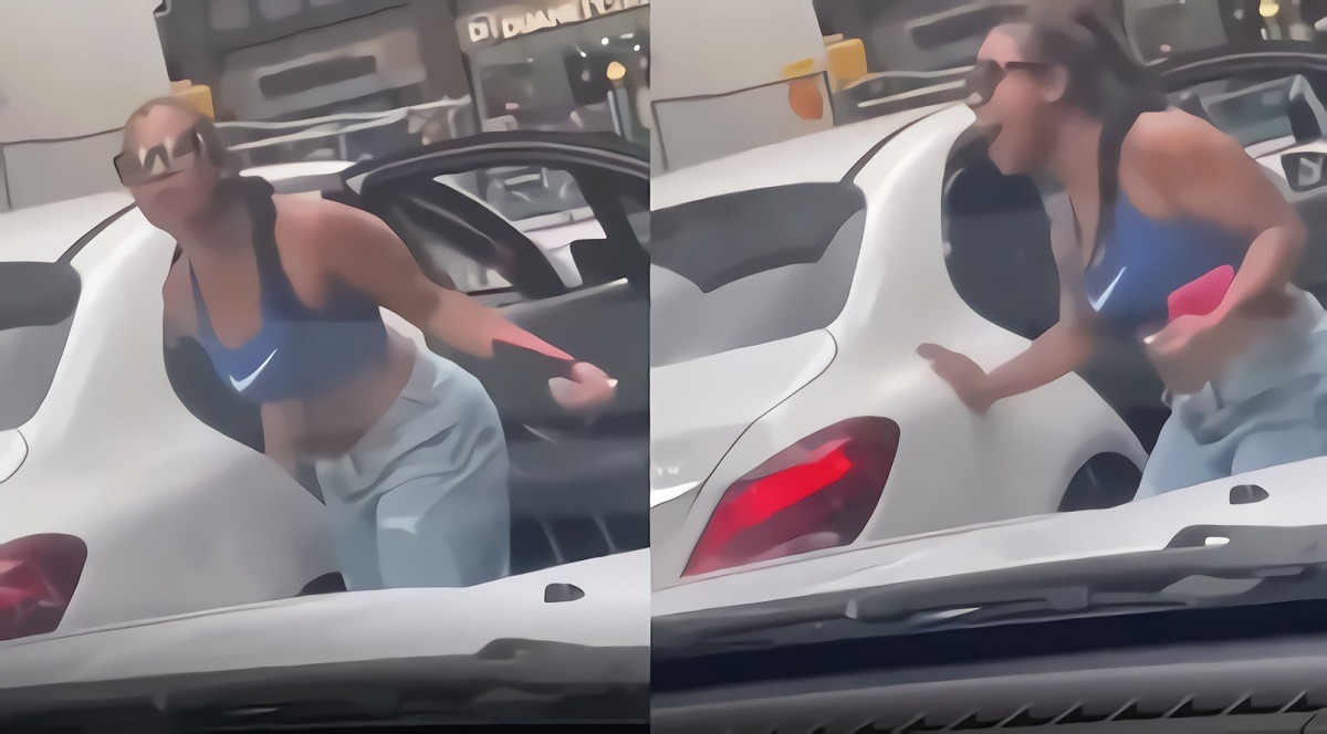 Video Shows Car Running Over Twerking Woman's Foot Leading to Her Breaking Her Friend's Mercedes-Benz in Middle of Road. Car Runs Over Foot of Woman Twerking in Middle of Road Then She Breaks Her Friend's Mercedes-Benz Car running over the foot of the Twerk dancing woman.