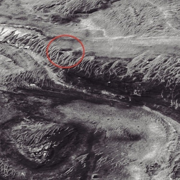 Do Leaked NASA Images Show a Disc Shaped UFO Alien Base on Mars Built into a Cliff? Do Leaked NASA Images Discovered by Scott Waring Show a UFO Alien Base on Mars? NASA photos show what appears to be a half-mile wide metallic disc embedded into a cliff on Mars that could possibly be a UFO Alien base. 