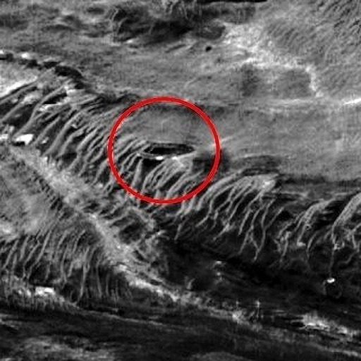 Do Leaked NASA Images Show a Disc Shaped UFO Alien Base on Mars Built into a Cliff? Do Leaked NASA Images Discovered by Scott Waring Show a UFO Alien Base on Mars? NASA photos show what appears to be a half-mile wide metallic disc embedded into a cliff on Mars that could possibly be a UFO Alien base. 