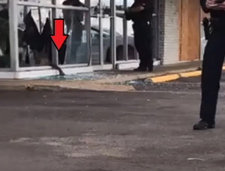 Police Release Surveillance Camera Photos of Two Men Who Shot Young Dolph Dead at Makeda's Cookies . Memphis Police Release Security Camera Pictures of Two Men Who Killed Young Dolph at Makeda's Butter Cookies. Photos of Young Dolph's killers released by Memphis Police. photo from video of the young dolph shooting. Young Dolph Dead body arm out window.