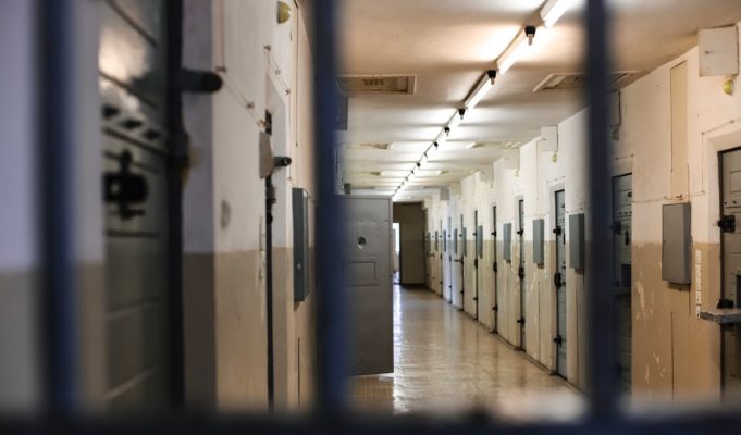 New Prison Photo of Fetty Wap in Jail Looking Depressed Behind Muscular Man Goes Viral