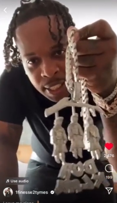 Rapper Finesse2Tymes 'Duh Klan' Chain Jewelry showing KKK Members being hanged