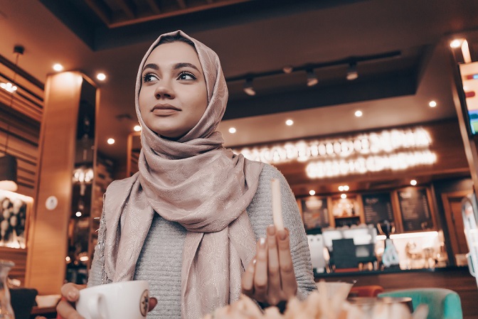 a woman masturdating at restaurant