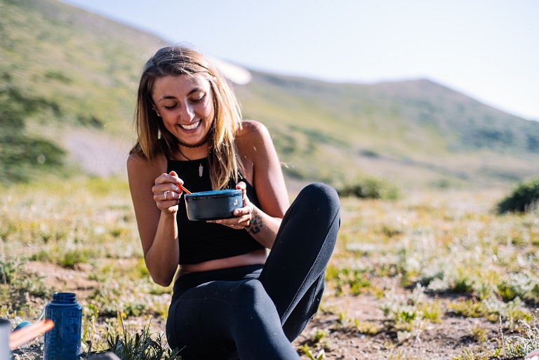 a woman masturdating in the wilderness