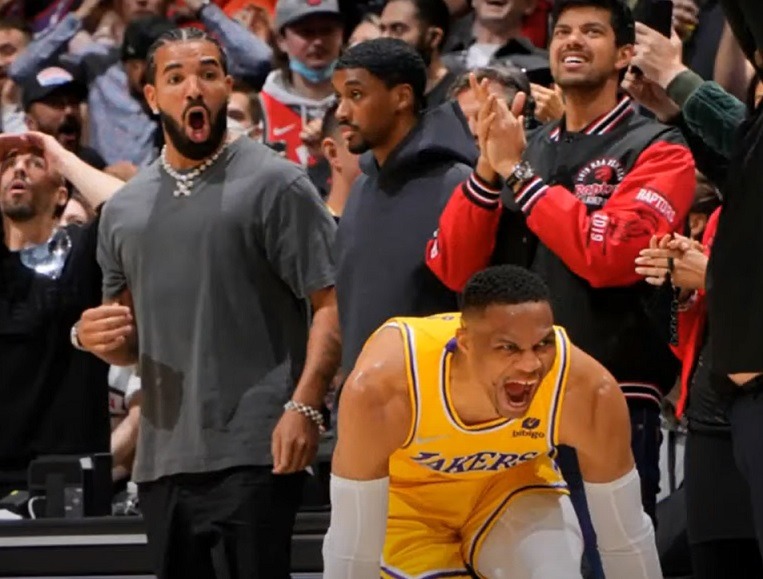 Drake's reaction to Russell Westbrook's three point shot to tie game during Lakers vs Raptors creating a Drake meme.