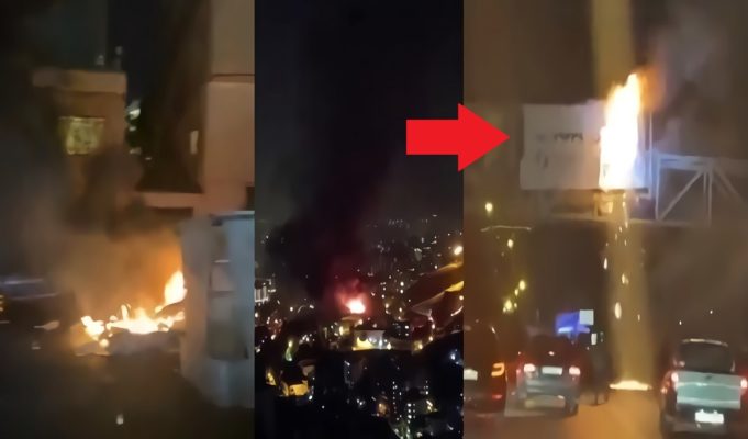 Videos Show Evin Prison Burning on Fire after Explosions in Tehran Iran as Security Guards Shoot Prisoners with Protesters Setting Billboards on Fire Outside