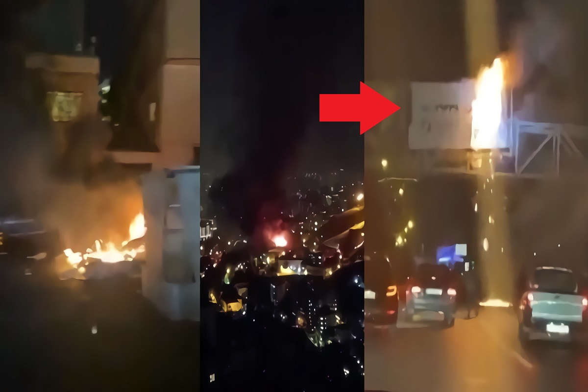 Videos Show Evin Prison Burning on Fire after Explosions in Tehran Iran as Security Guards Shoot Prisoners with Protesters Setting Billboards on Fire Outside