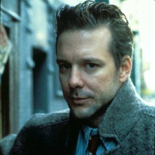Image of Mickey Rourke's face before plastic surgery.