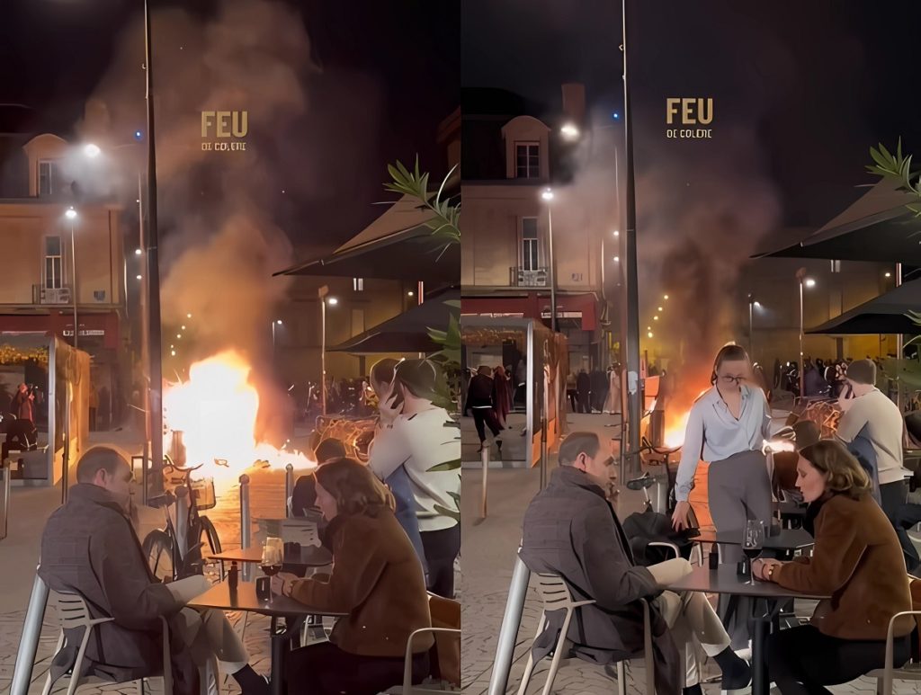 People in France Calmly Eating in Front Massive Protest Fire Sparks 'This is Fine' Meme Comparisons
