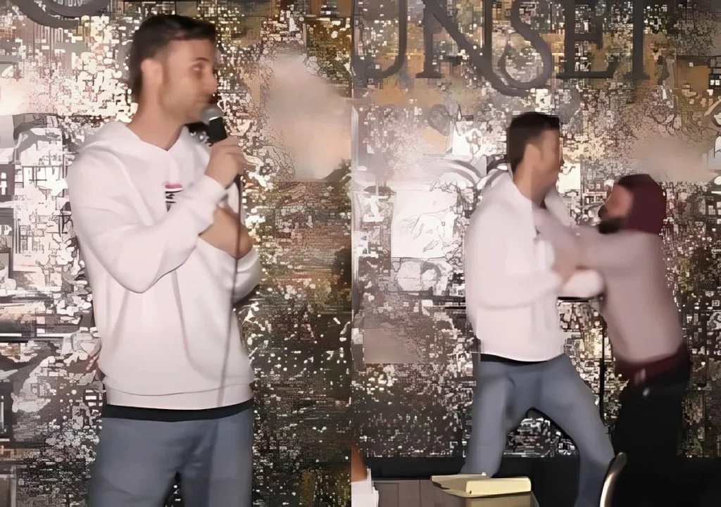 Comedian Johnny Mitchell Gets Attacked by Heckler For Calling Him a 'Snitch' During Show in Viral Video