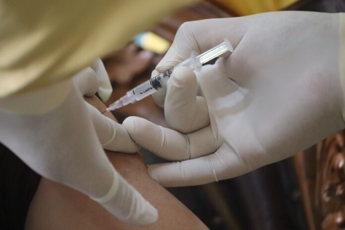 joe-biden-omnibus-spending-bill-covid-vaccine-conspiracy-1