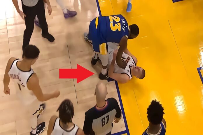 jordan-poole-draymond-green-nikola-jokic-injury-2