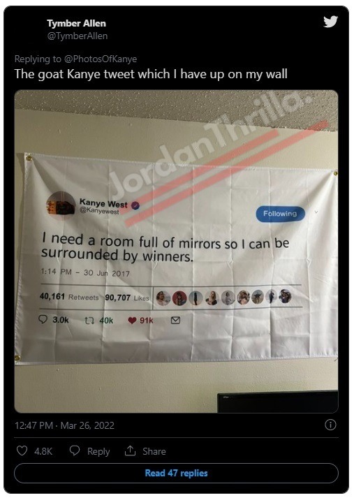 Man's Kanye West tweet poster hanging in rom.