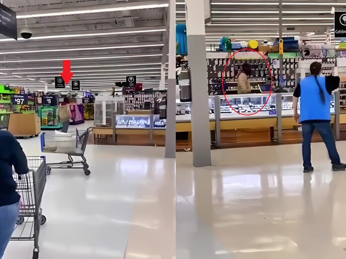 man-smashing-jewlery-cases-in-walmart