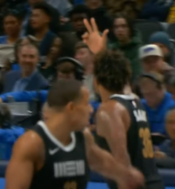 Marcus Smart Shows the Crowd his Dislocated Finger after Making Three Point Shot
