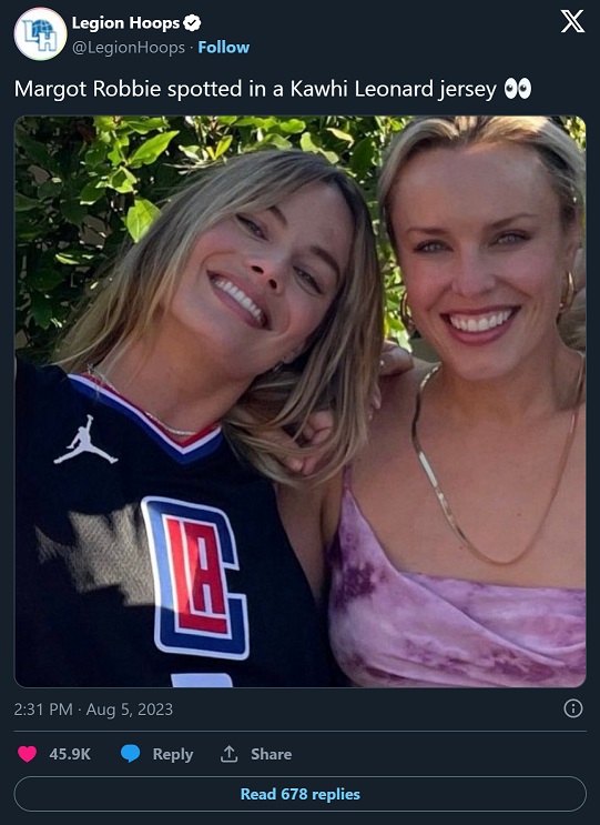 Margot Robbie wearing a Kawhi Leonard Jersey