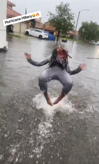 black woman botches backflip attempt in Hurricane Hilary flood water celebrating video