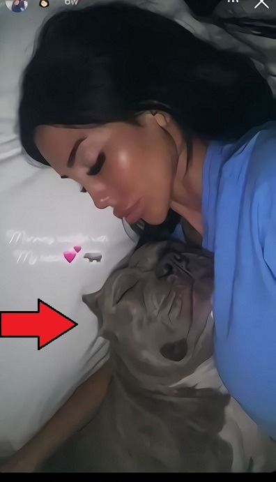 Photo of transgender woman Big Bambina with Dillon Brooks dog.
