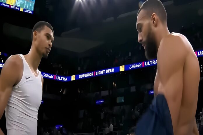 victor-wembanyama-tosses-rudy-gobert-jersey-away-3