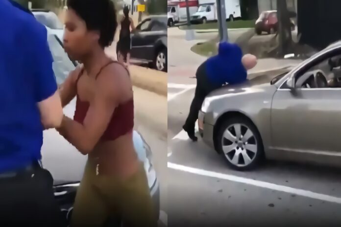 white-man-blue-shirt-blocking-black-woman-car-5