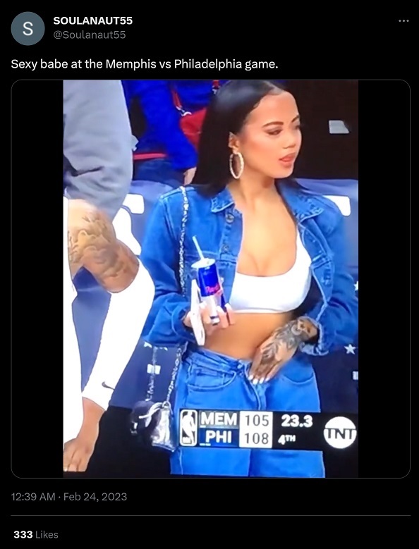 Instagram Model Woman Wearing White Sports Bra and Drinking Red Bull During Grizzlies vs Sixers Game Goes Viral
