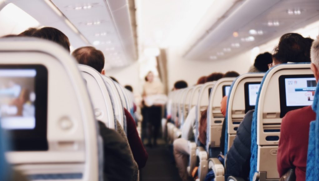 woman-boyfriend-first-class-tickets-airplane
