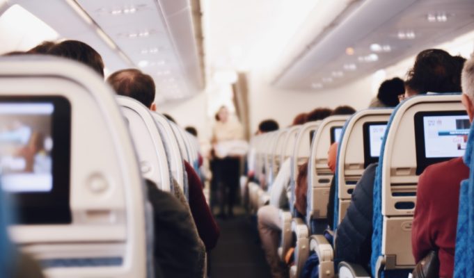 woman-boyfriend-first-class-tickets-airplane