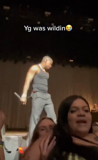 rapper YG kicking a woman off stage because he thought she was too ugly